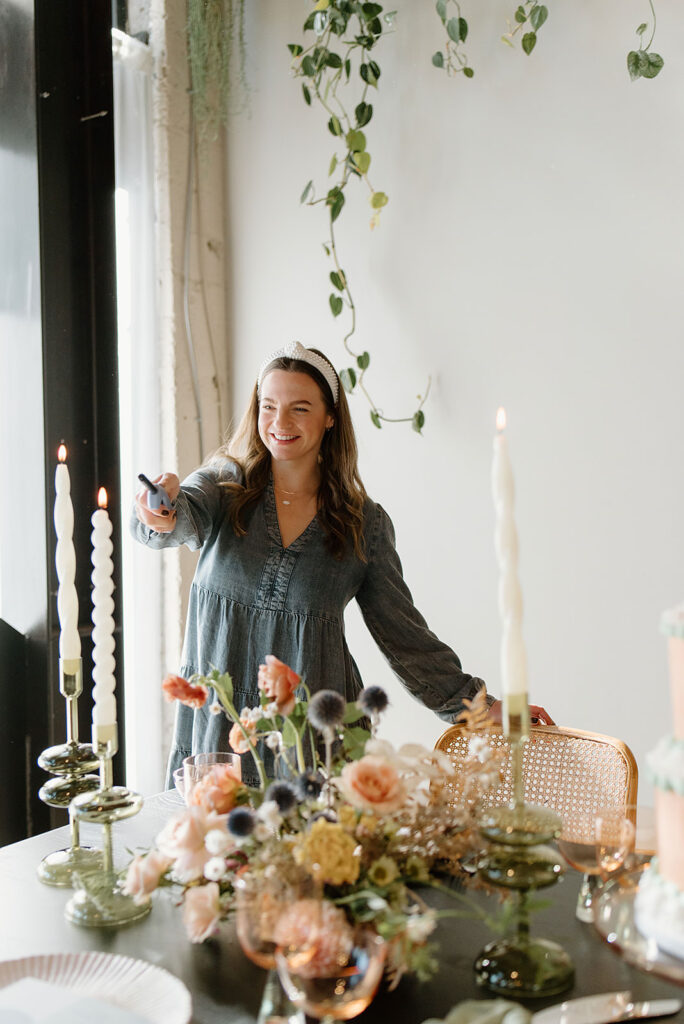 Meghan, from Sideways and Co., lighting a candle